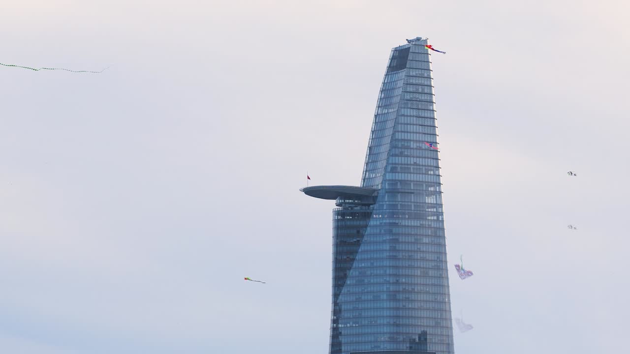 Sunset flying kites with Bitexco, Saigon, Ho Chi Min City, Vietnam part 2