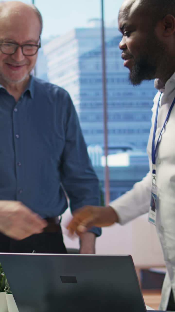 Vertical Video Senior people consulting financial advisor about retirement and pension planning