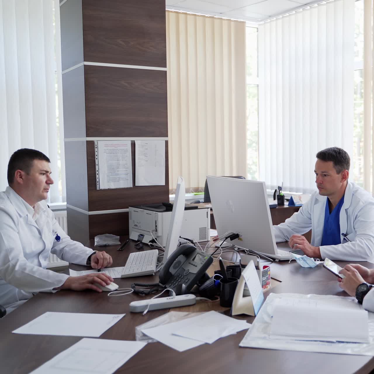 Technicians working together at clinic