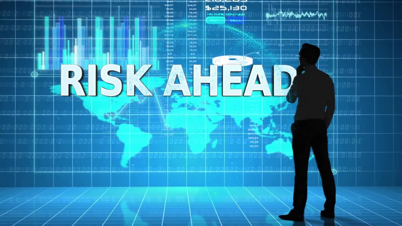 Animation of risk ahead text, world map and financial data processing over businessman