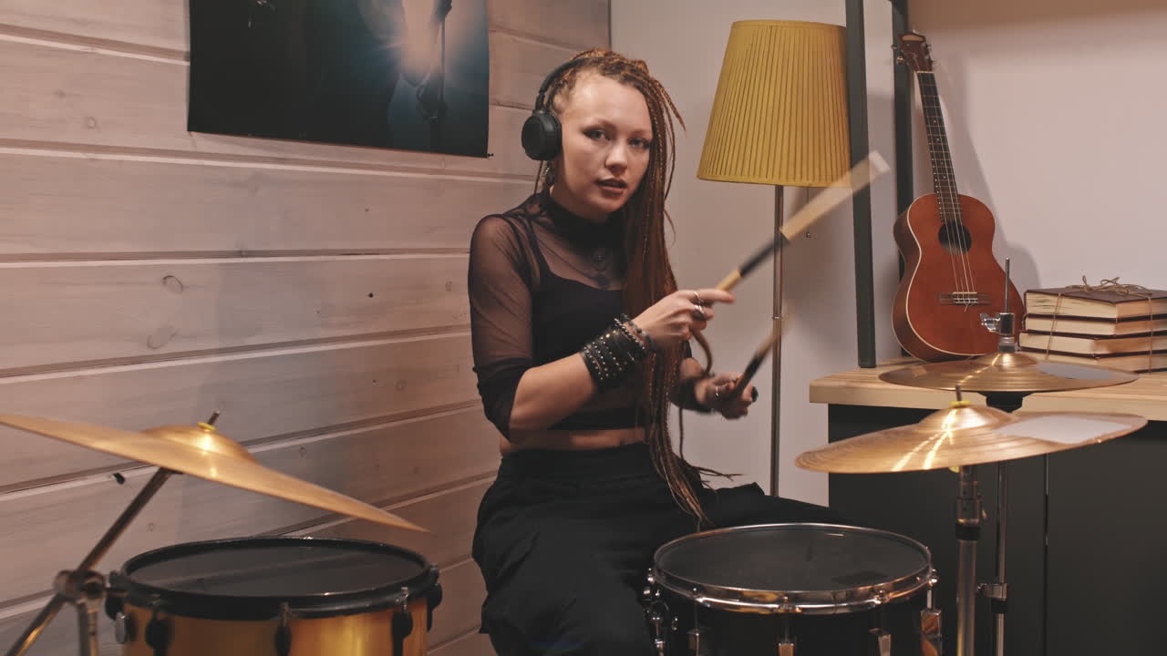 Female Rock-n-Roll Star Playing Drums