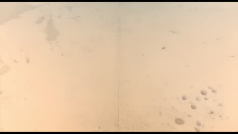 animation of rain drops over pink background