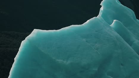 closeup of bluish iceberg on argentino lake in los glaciares national park, santa cruz, argentina