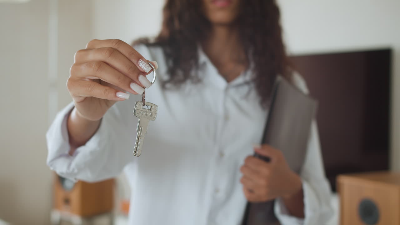 Woman with keys of new house