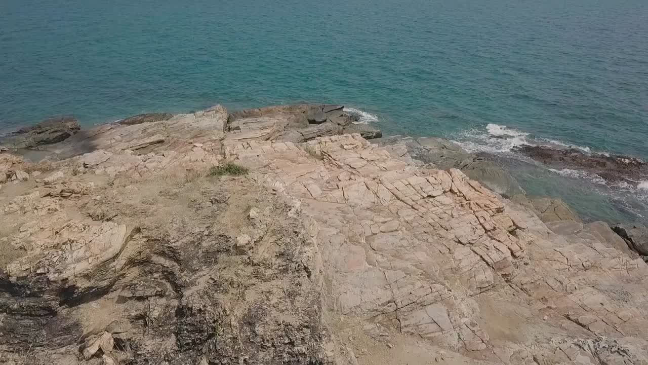 Aerial shot moving forward to the ocean