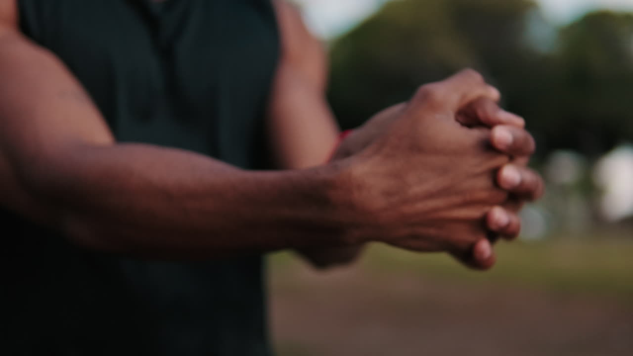 Athlete Stretching Hands in the Park
