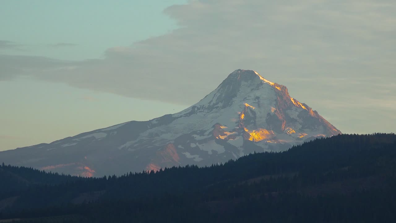 Sunset light on Mt Hood near Hood River Oregon with farms and fields foreground 2