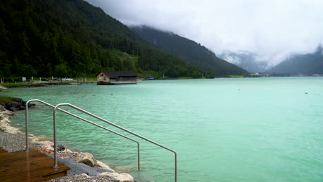 beautiful mountain lake in the alps of austria with turquoise water