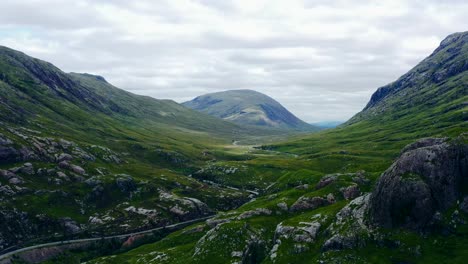 Aerial-Drone-Shot-of-Road-Through-Scotland's-Glen-Coe-Hills