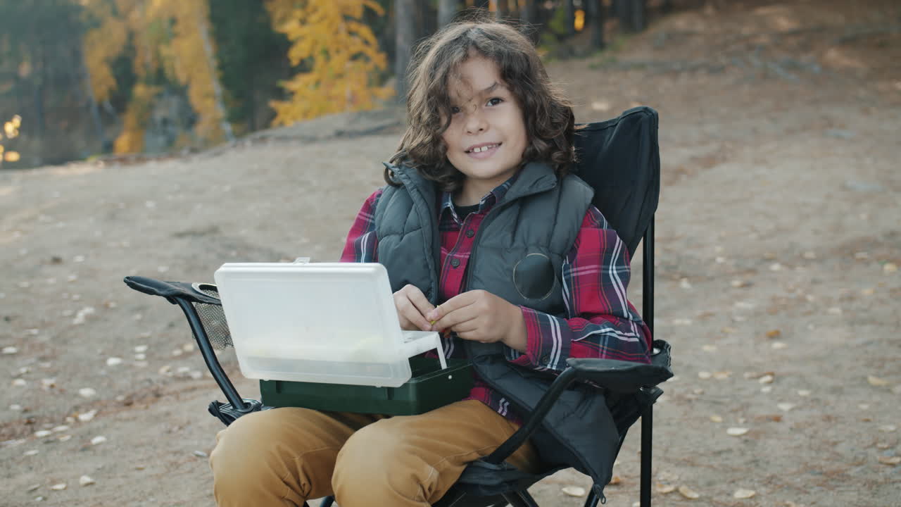 Boy enjoying a snack outdoors