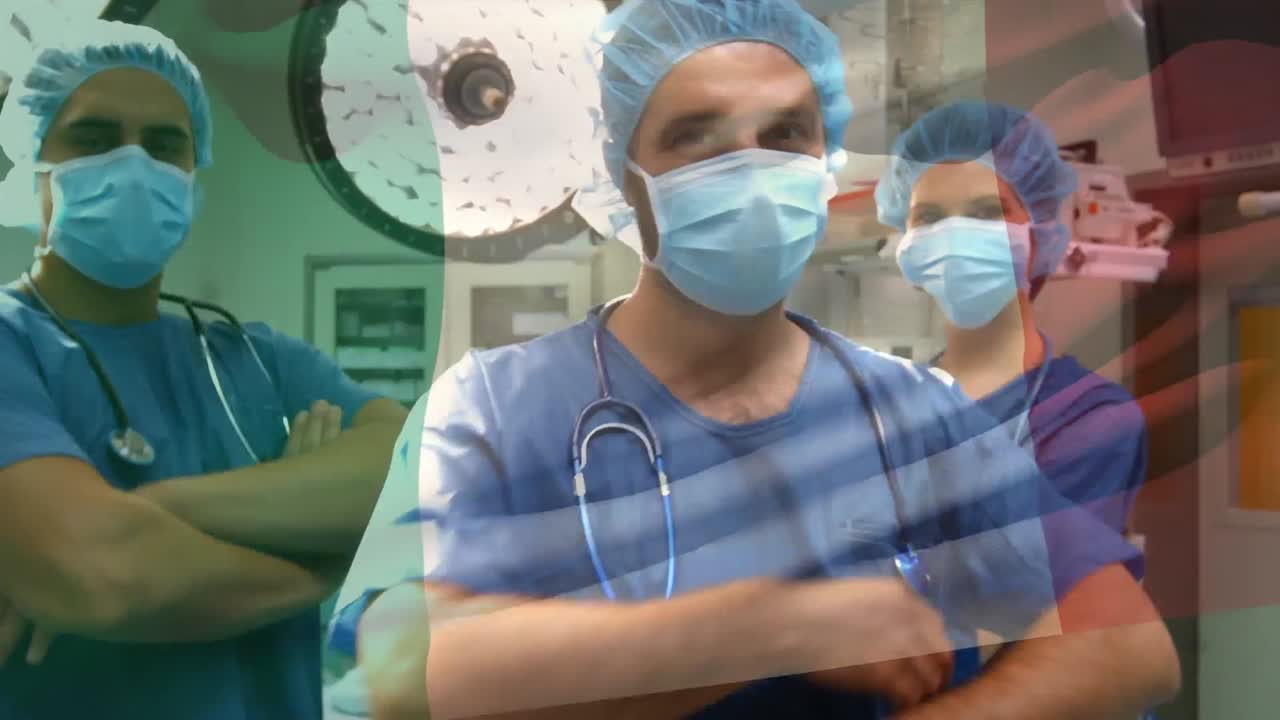 animación de la bandera de italia ondeando sobre los cirujanos en el quirófano