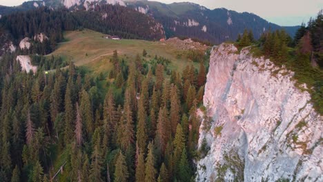 Experience-the-beauty-of-a-summer-mountain-ridge-at-sunset-with-vibrant-colors,-captured-by-a-mesmerizing-drone-footage