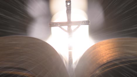 Animation-of-christian-cross-with-bible-on-glowing-background