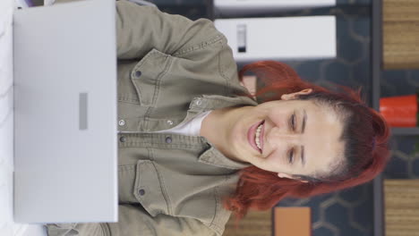 Vertical-video-of-Business-woman-finishing-her-work-and-relaxing.