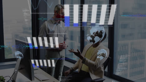 Animation-of-graphs,-globes,-computer-language,-diverse-coworkers-wearing-mask-discussing-in-office