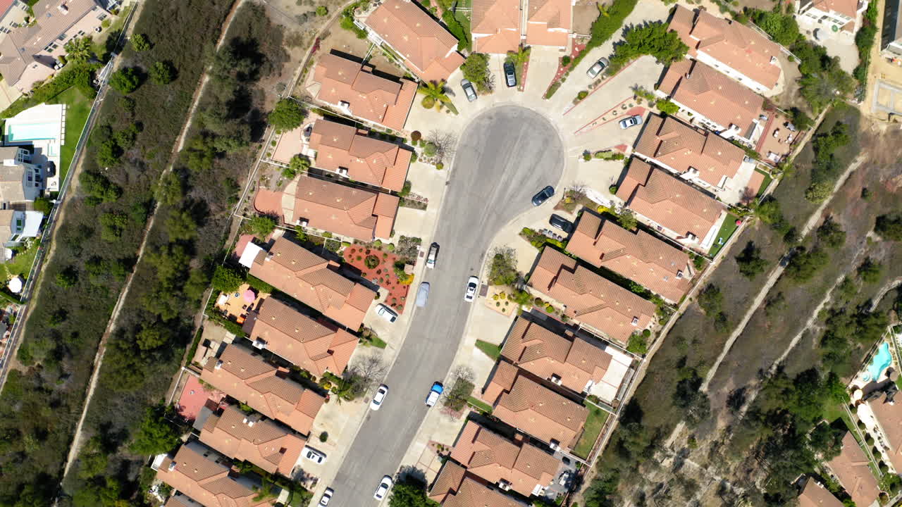 Aerial View of a Suburban Residential Neighborhood with Cul-de-Sac and Houses