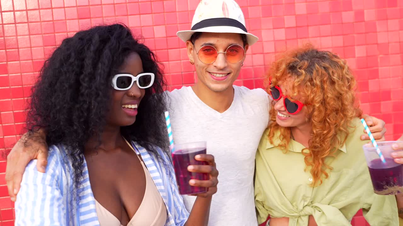 Friends enjoying summer drinks together