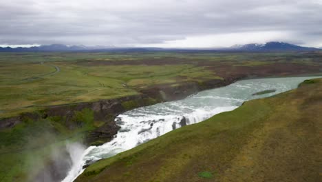 gullfoss waterfalls in iceland with drone video low and moving down