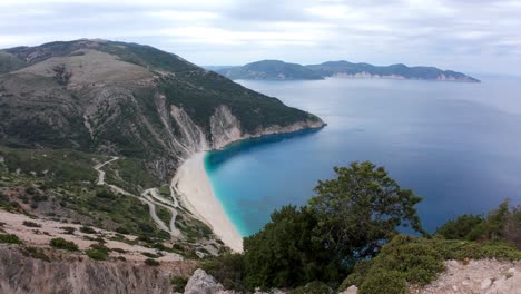 panoramic view from high vantage point overlooking myrtos beach, kefalonia, greece