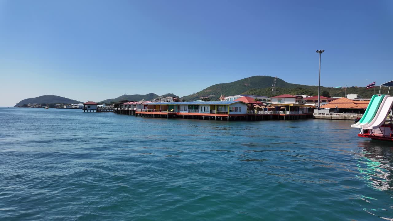 Koh Larn port island Chon Buri Thailand houses on stilts over water Southeast Asia