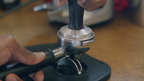 making espresso - barista preparing a shot