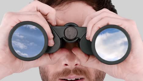 Man-looking-through-binoculars-