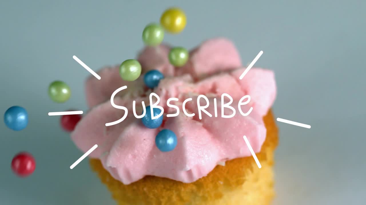La prima perla che cade su un cupcake, decorando la glassa ed evidenziando il testo ISCRIVITI.