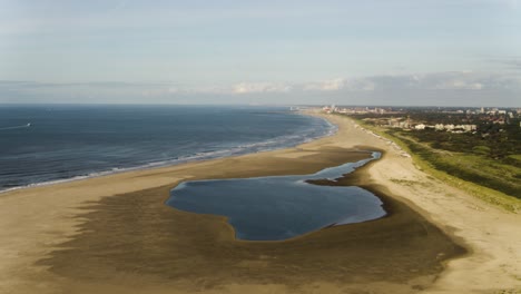 Aerial-Drone-Shot-of-The-Sand-Motor-The-Artificially-Created-Sandbar-in-The-Netherlands