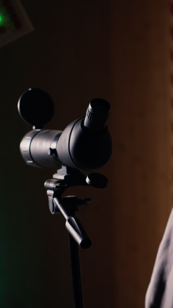 Vertical video Friends in firing range shooting, zooming to check points scored on bullseyes