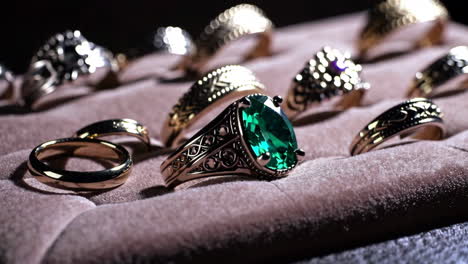 collection of vintage rings with emerald gemstones