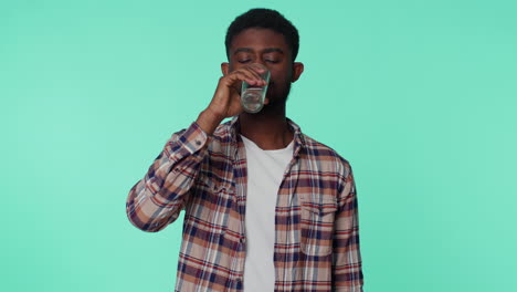 man touching cheek suffering from toothache cavities or gingivitis waiting for dentist appointment