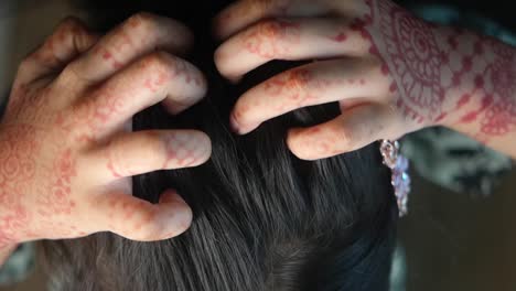 woman with henna on her hands