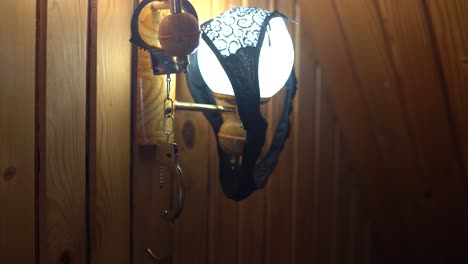 handcuffs-and-underwear-on-the-lamp