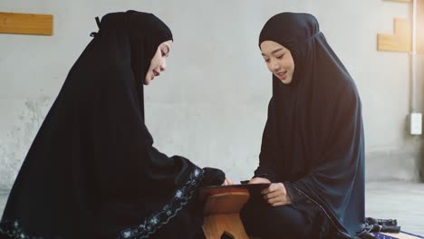 asian muslim woman praying and prostrating at home