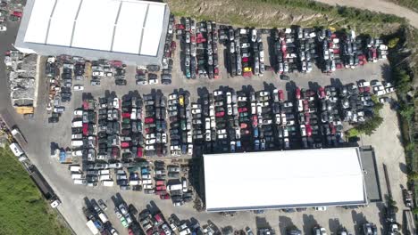 Aerial-view-of-a-junkyard-and-large-group-of-wrecked-cars