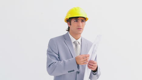 architect wearing a yellow helmet