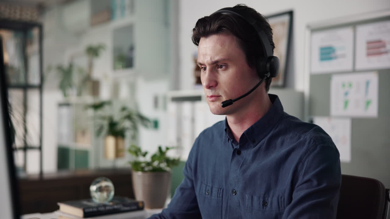 Man wearing headset in office