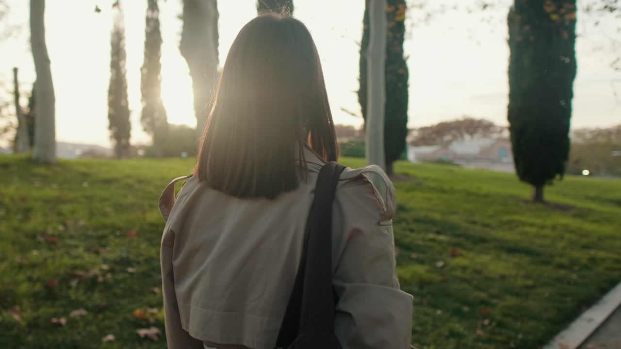 Woman walking in a park