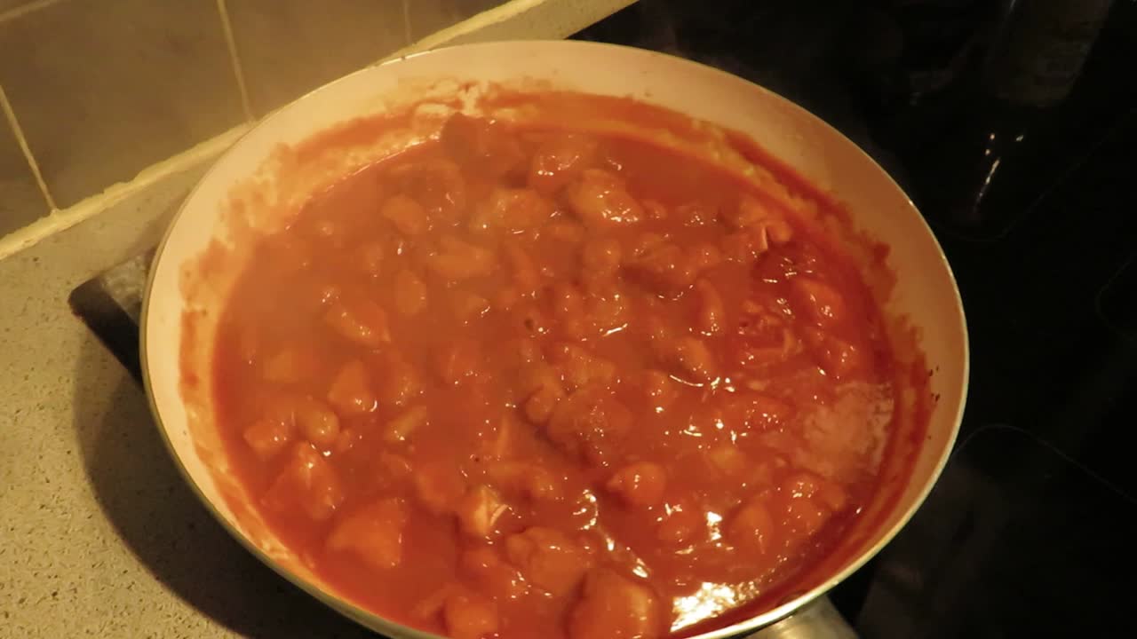 Chicken Curry Cooking in a Frying Pan