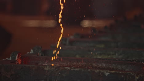 molten metal pouring into mold