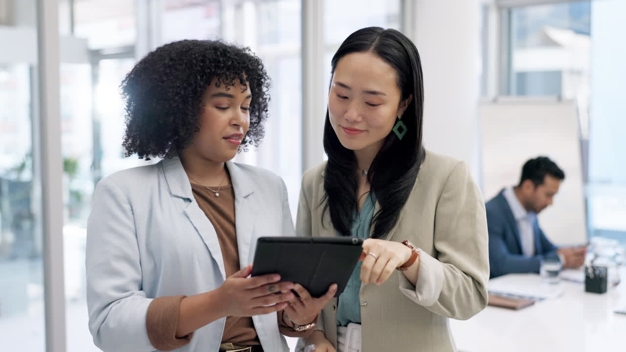 Business women, tablet and project discussion