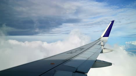 dramatic beautiful white clouds view from airplane windows