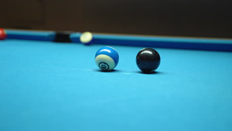 billiard, shot. blue table, red rolling ball