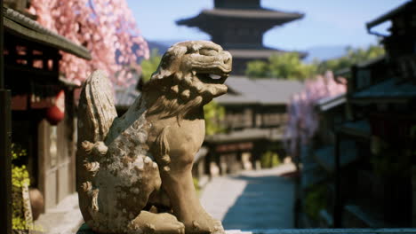 stone lion statue in a japanese garden