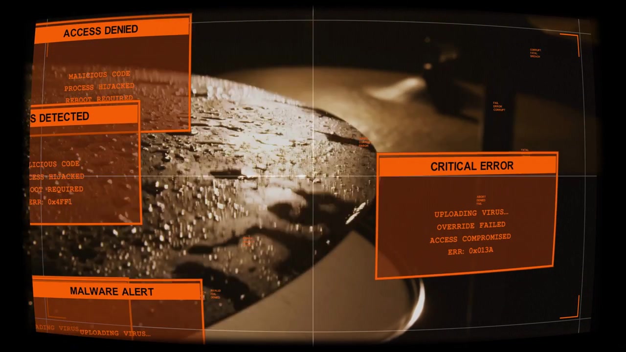 Wet reflective metal lid, security detecting virus and sending orange alerts sliding over lid