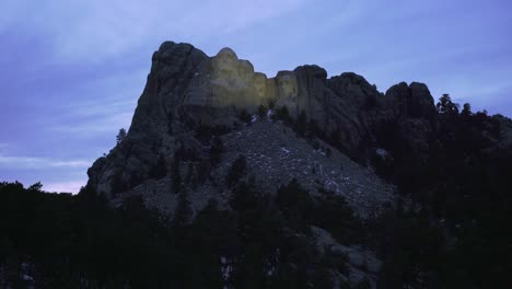 mount rushmore at night under lighs mountain in south dakota