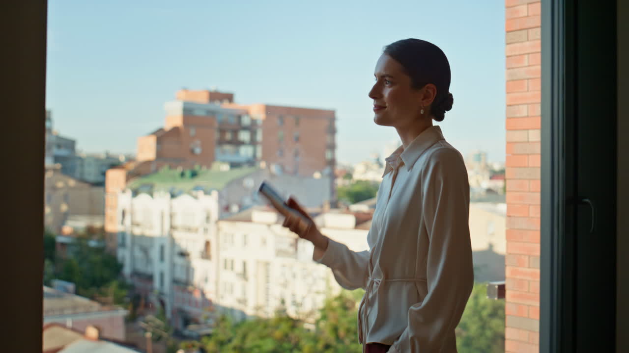 Smiling corporate employee calling cellphone in office closeup. Successful woman