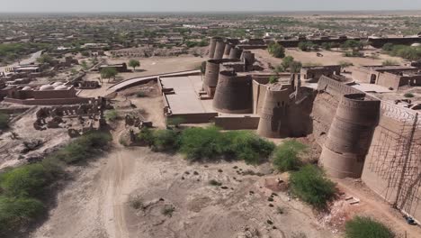 Side-angle-drone-view-of-the-Derawar-fort-walls-and-gate