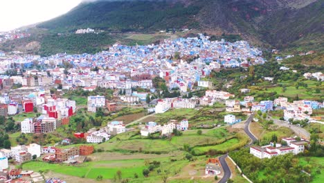 Rising-Vista-Aérea-Over-The-Blue-City-In-Morocco-1