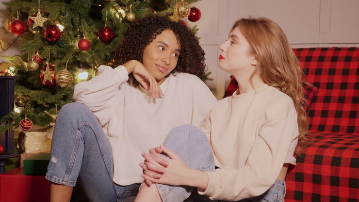 Two women enjoying Christmas together